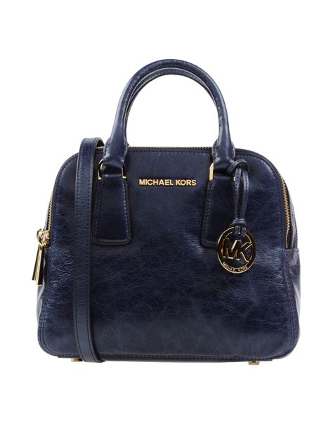 michael kors blue glitter purse|More.